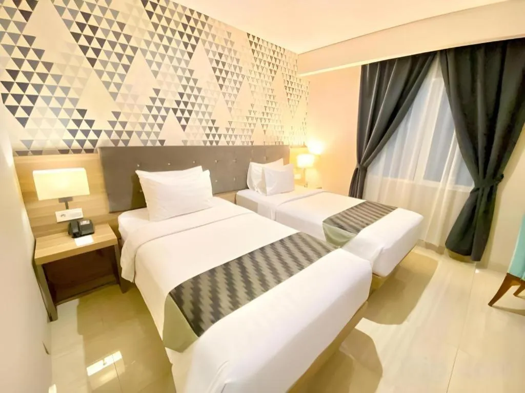 Bed in Orchardz Hotel Gajah Mada