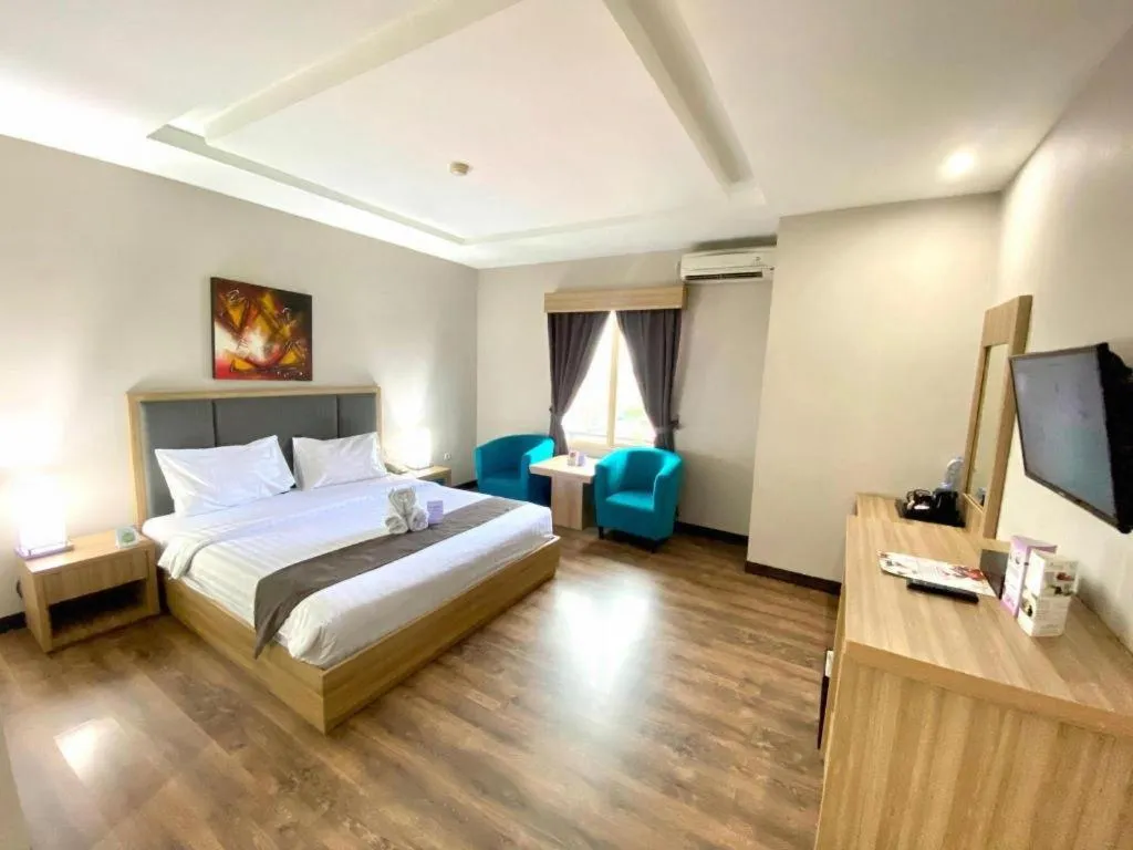 Bed in Orchardz Hotel Gajah Mada
