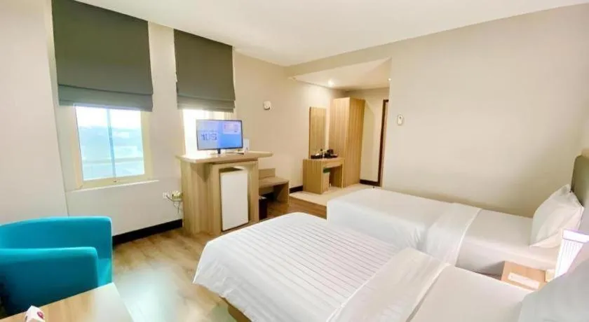 Bed in Orchardz Hotel Gajah Mada