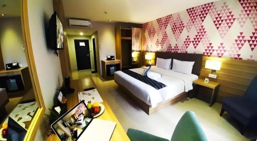 Bed in Orchardz Hotel Gajah Mada