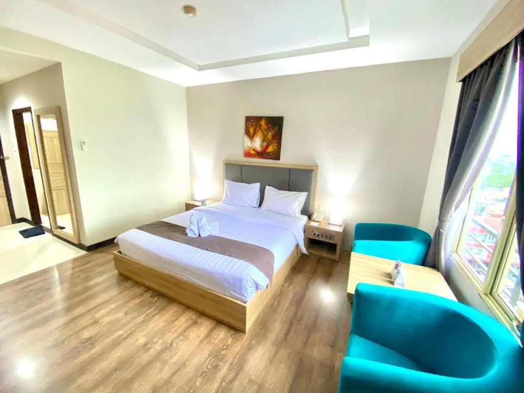 Bed in Orchardz Hotel Gajah Mada