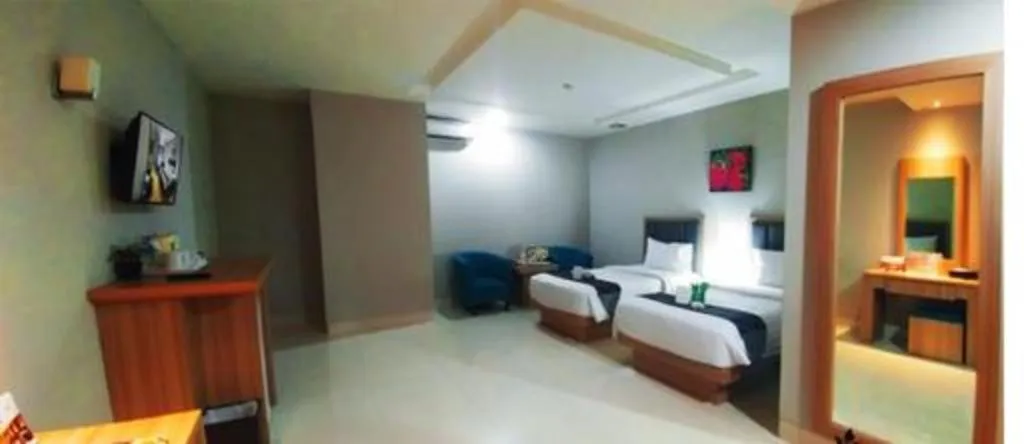 Bed in Orchardz Hotel Gajah Mada