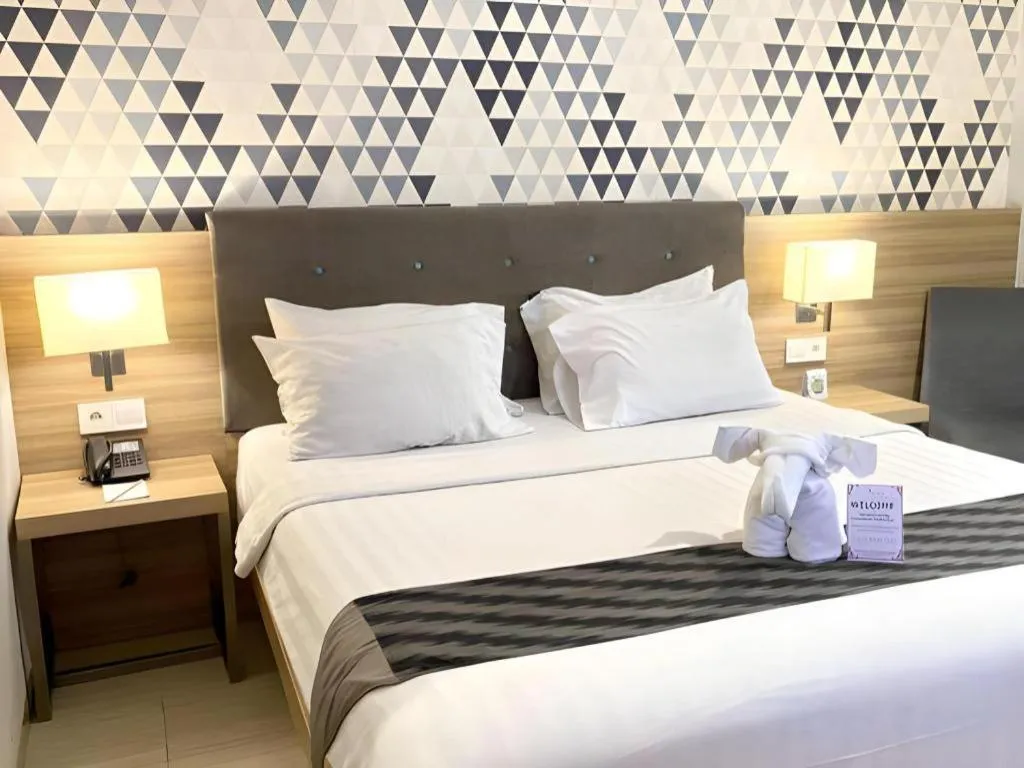 Bed in Orchardz Hotel Gajah Mada