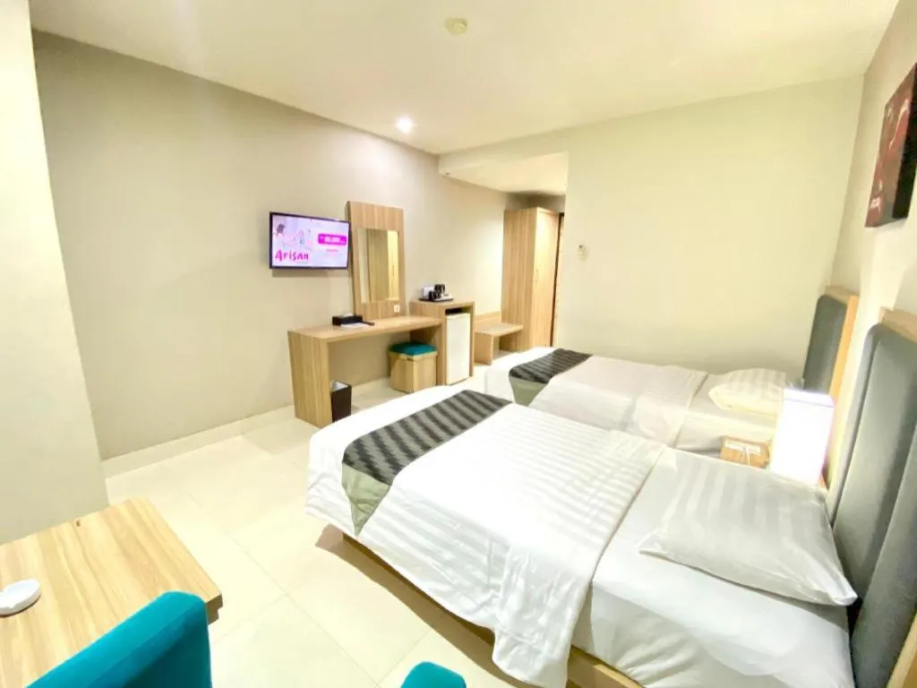 Bed in Orchardz Hotel Gajah Mada