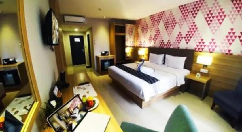 Bed in Orchardz Hotel Gajah Mada