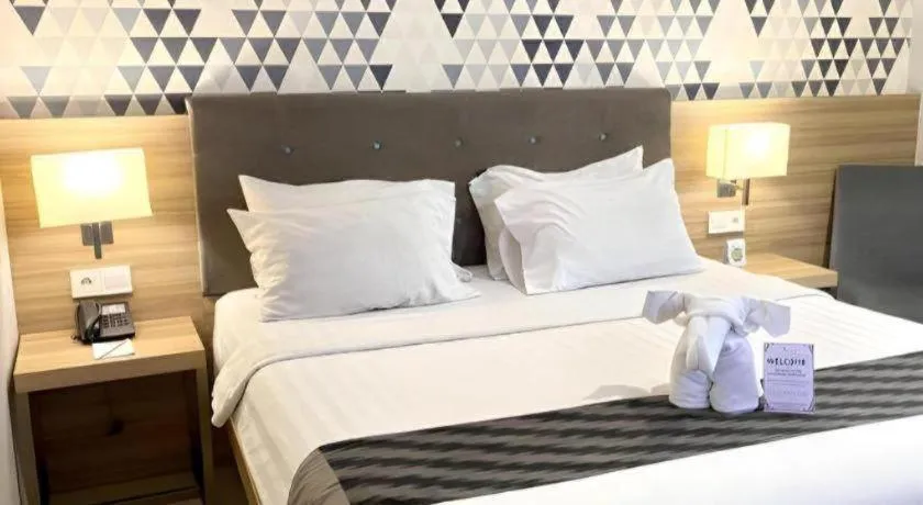 Bed in Orchardz Hotel Gajah Mada