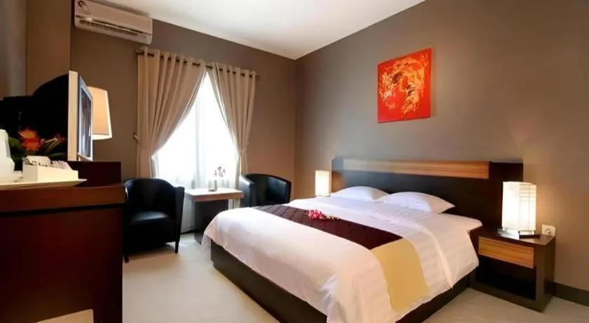Bed in Orchardz Hotel Gajah Mada