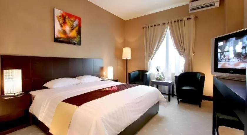 Bed in Orchardz Hotel Gajah Mada