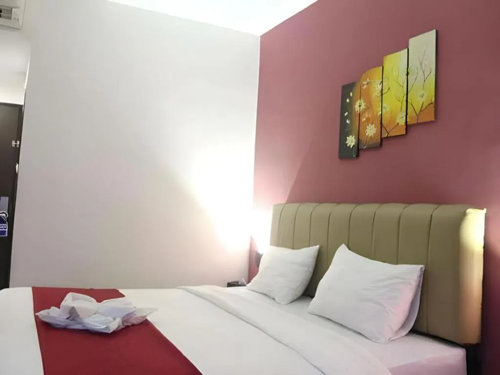 Bed in Garuda Hotel Pontianak