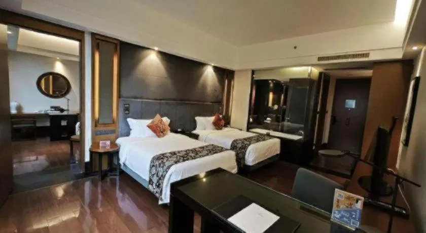 Bed in Worldhotel Grand Dushulake Suzhou