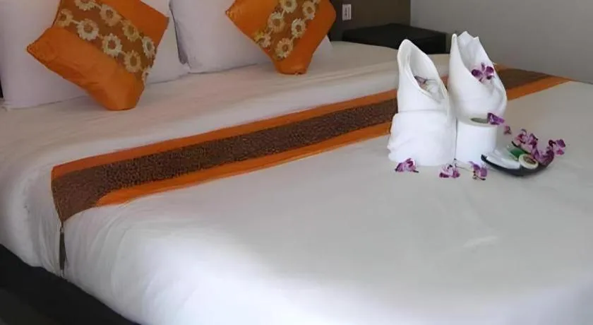 Bed in The Impress Khonkaen Hotel