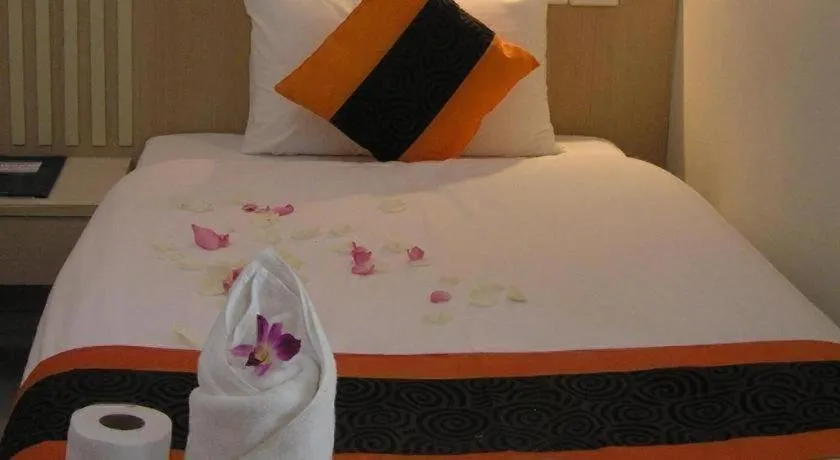 Bed in The Impress Khonkaen Hotel
