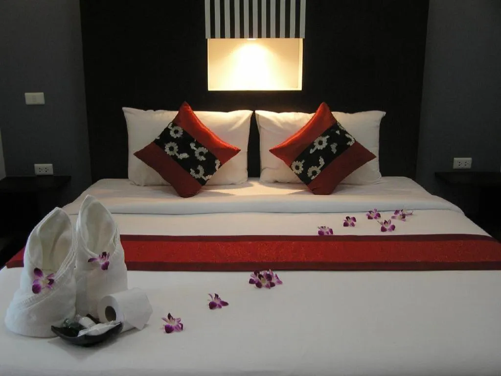 Bed in The Impress Khonkaen Hotel