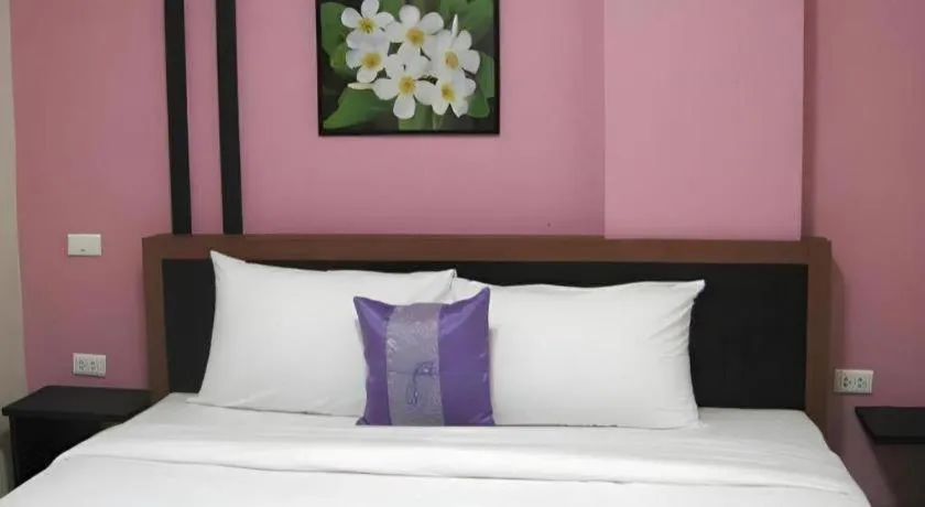 Bed in The Impress Khonkaen Hotel