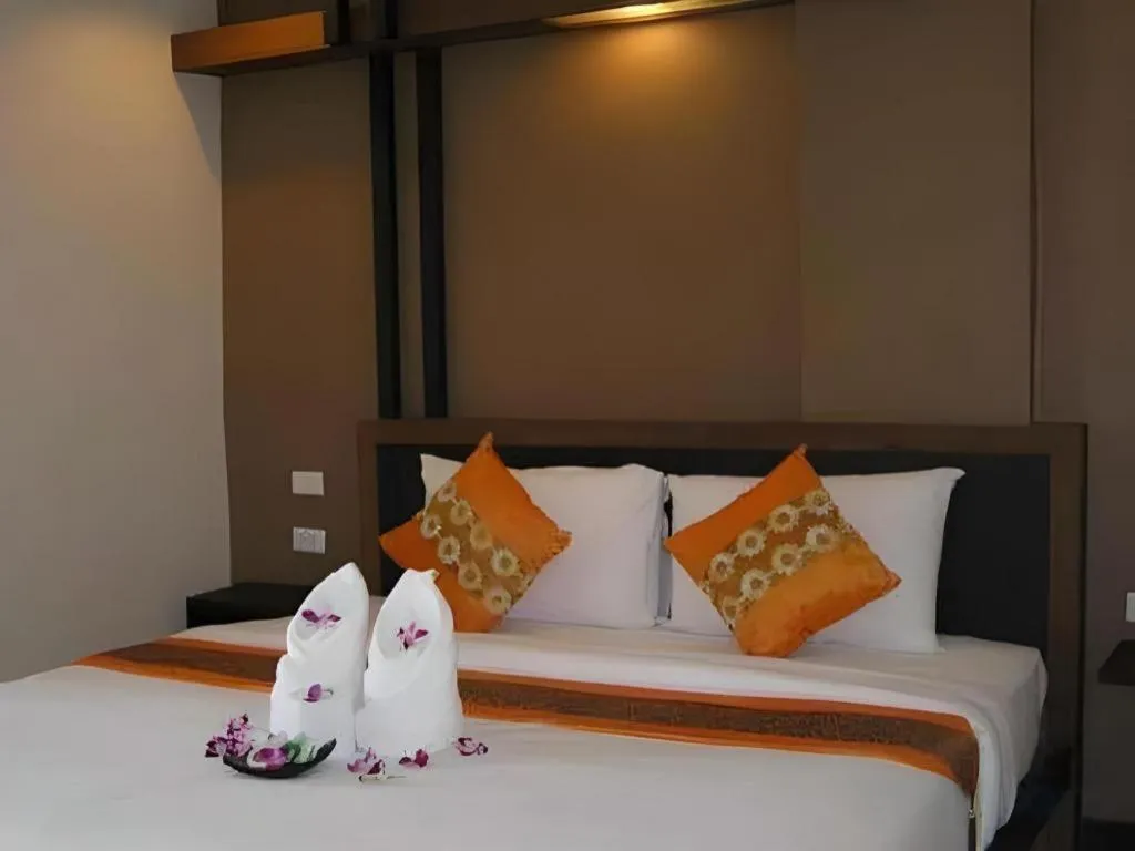 Bed in The Impress Khonkaen Hotel
