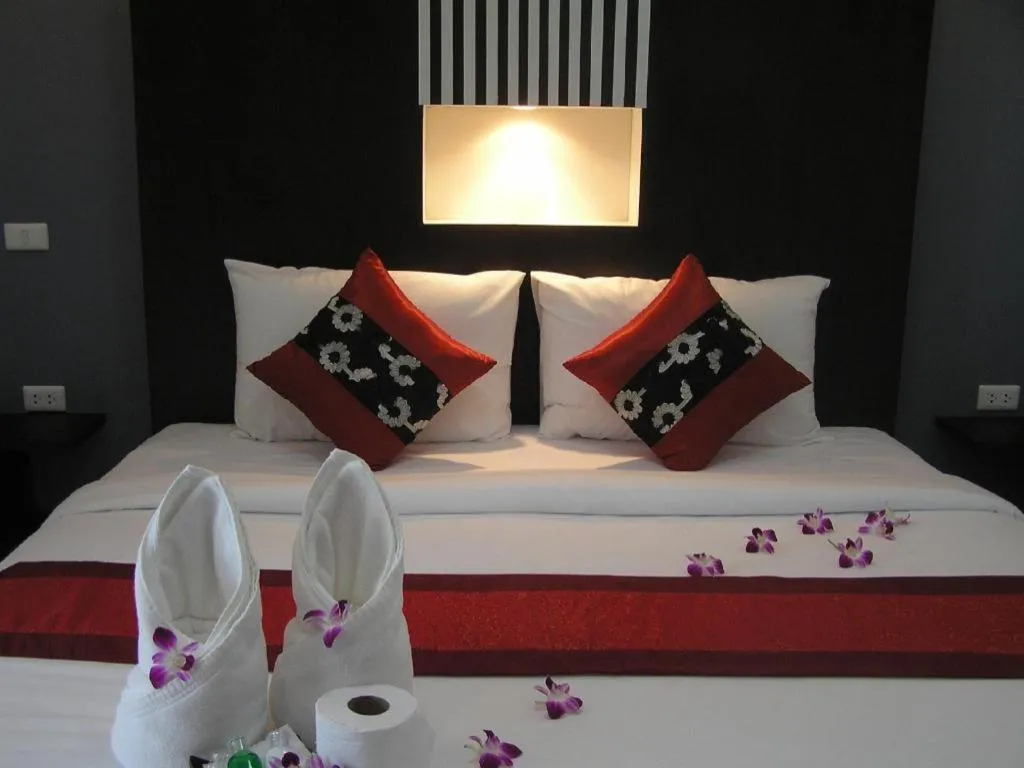 Bed in The Impress Khonkaen Hotel