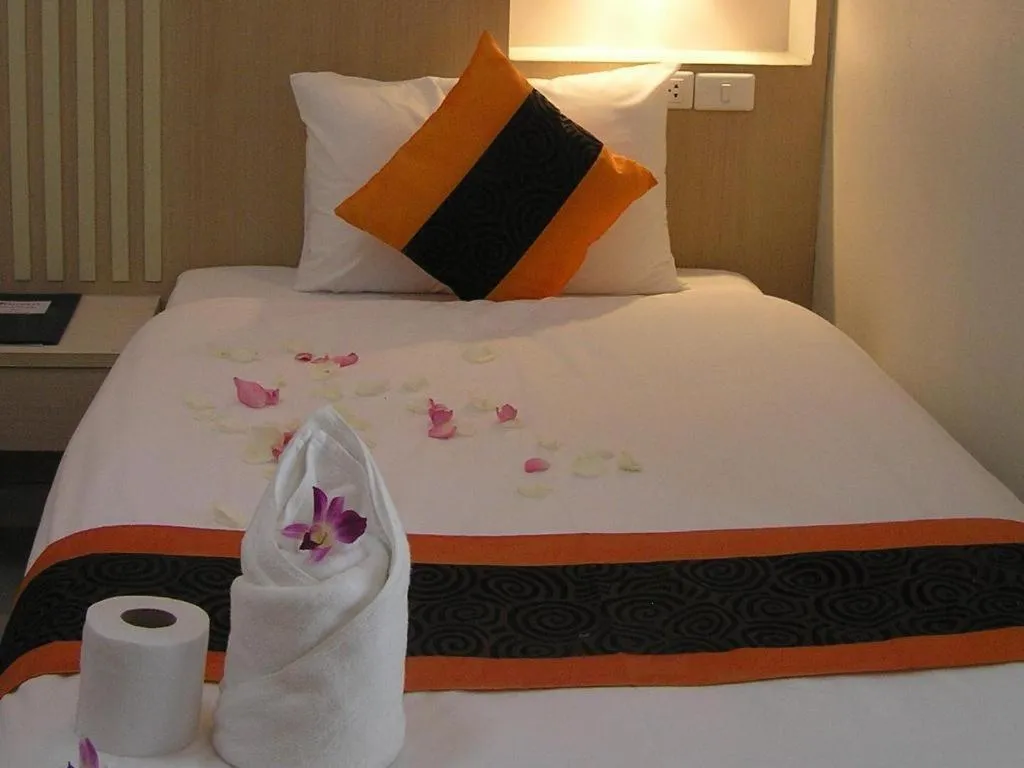 Bed in The Impress Khonkaen Hotel
