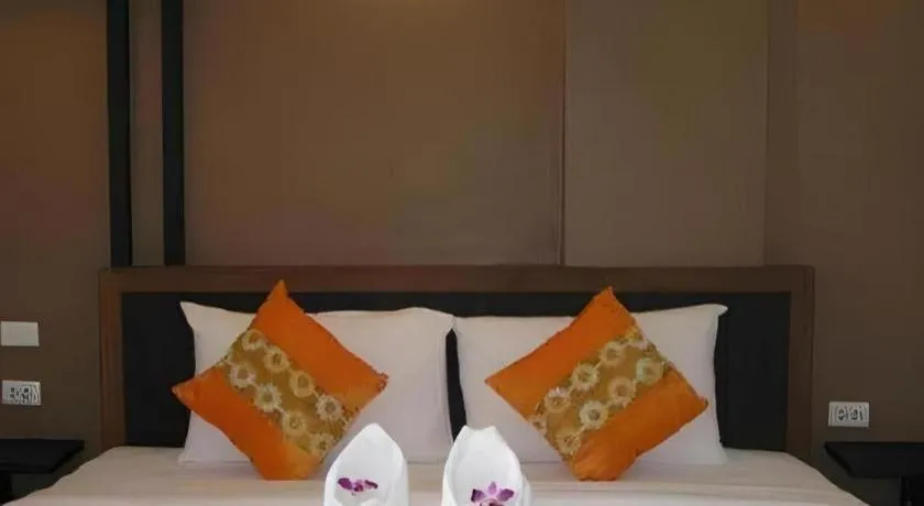 Bed in The Impress Khonkaen Hotel