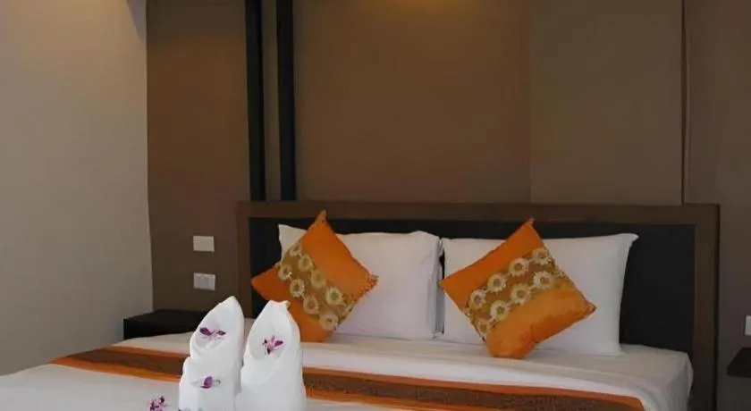 Bed in The Impress Khonkaen Hotel