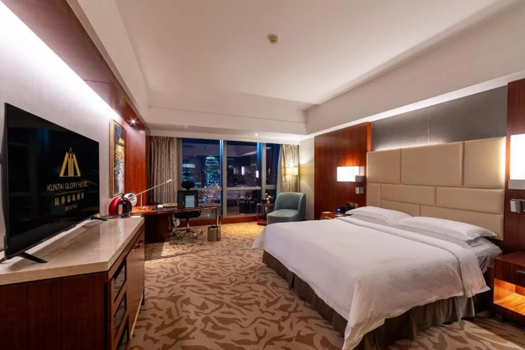 Bed in Kun Tai Glory Hotel Beijing Wangjing