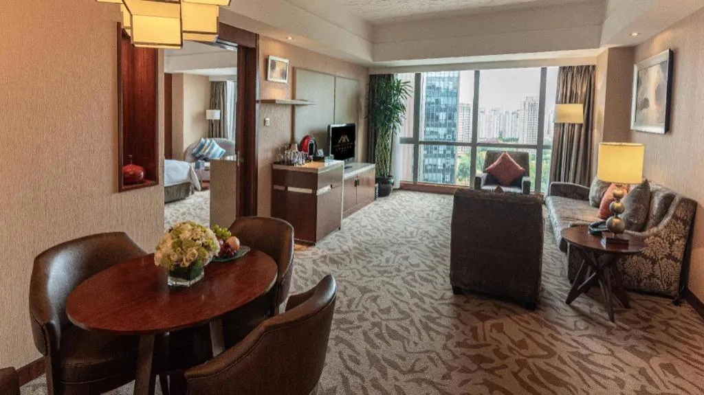 Bed in Kun Tai Glory Hotel Beijing Wangjing