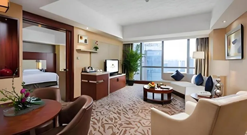 Bed in Kun Tai Glory Hotel Beijing Wangjing