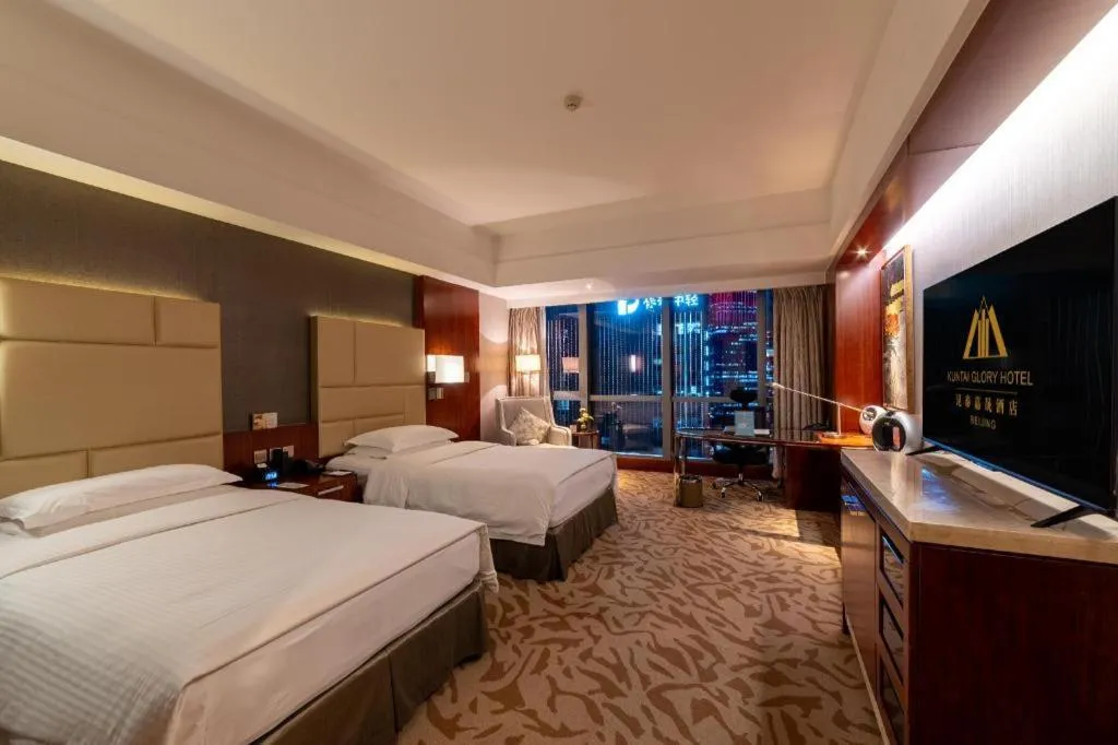 Bed in Kun Tai Glory Hotel Beijing Wangjing