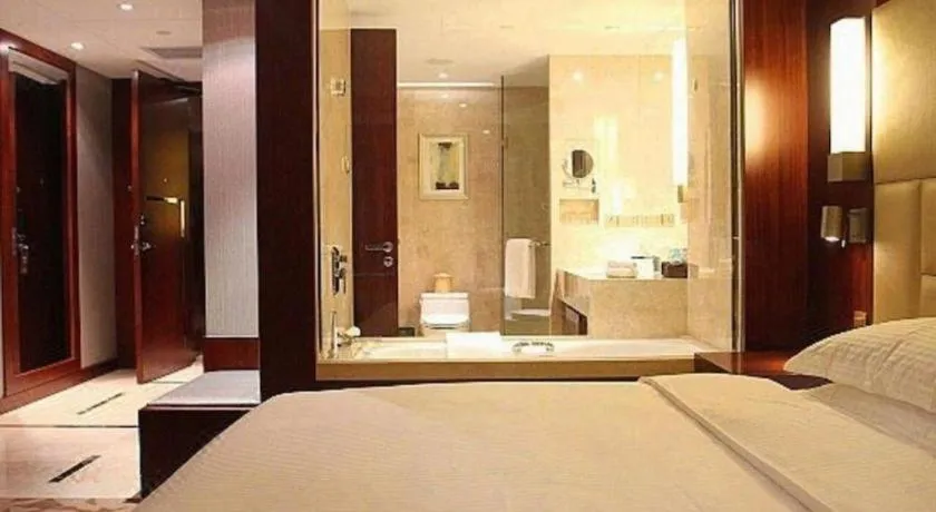 Bed in Kun Tai Glory Hotel Beijing Wangjing