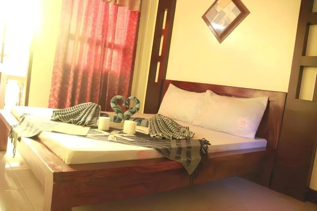 Bed in Costa Villa Beach Resort