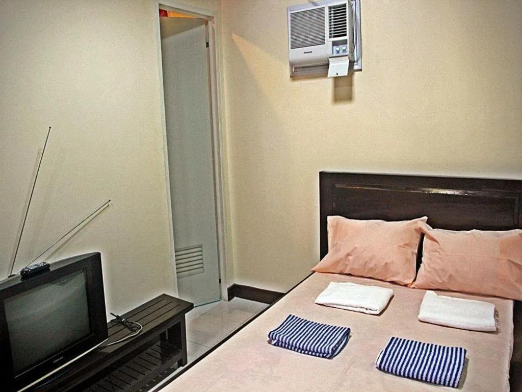 Bed in Costa Villa Beach Resort