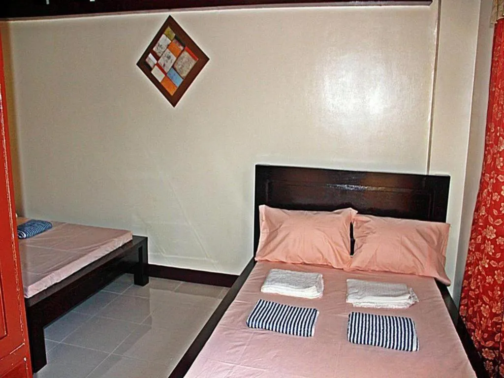 Bed in Costa Villa Beach Resort