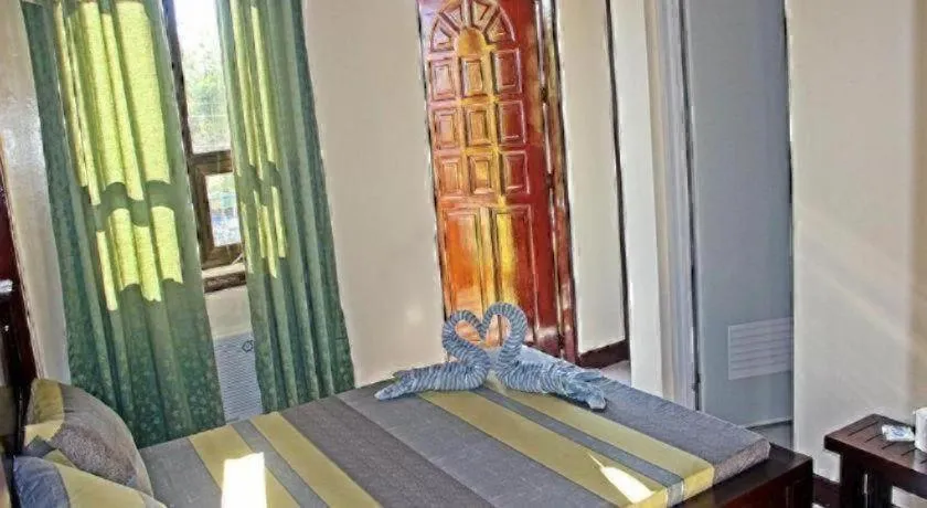 Bed in Costa Villa Beach Resort