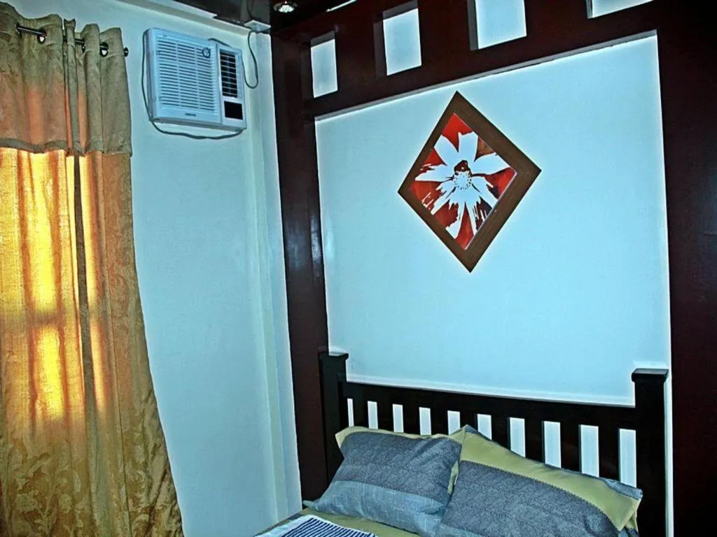 Bed in Costa Villa Beach Resort