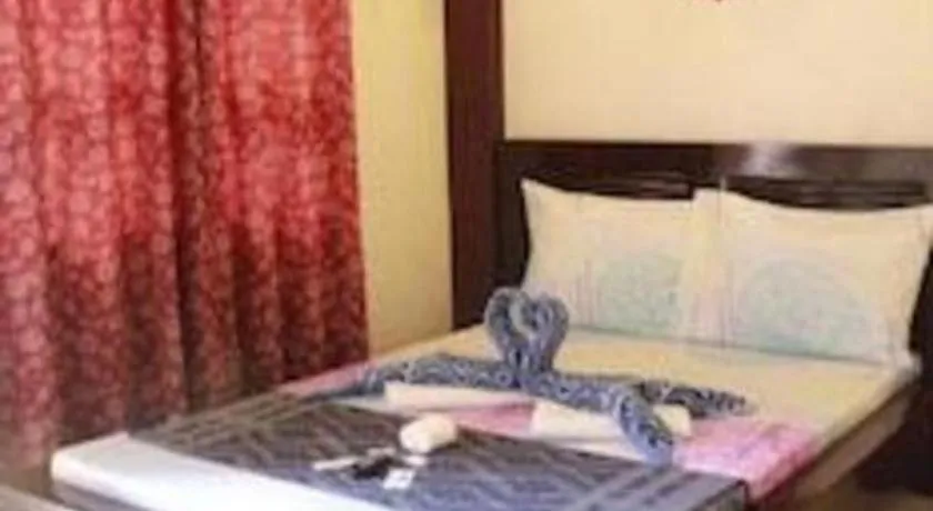 Bed in Costa Villa Beach Resort