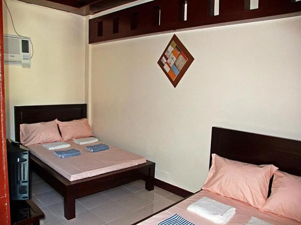 Bed in Costa Villa Beach Resort