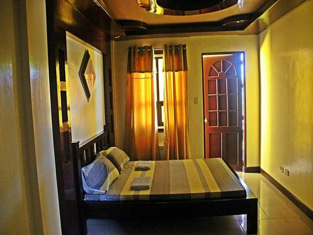 Bed in Costa Villa Beach Resort