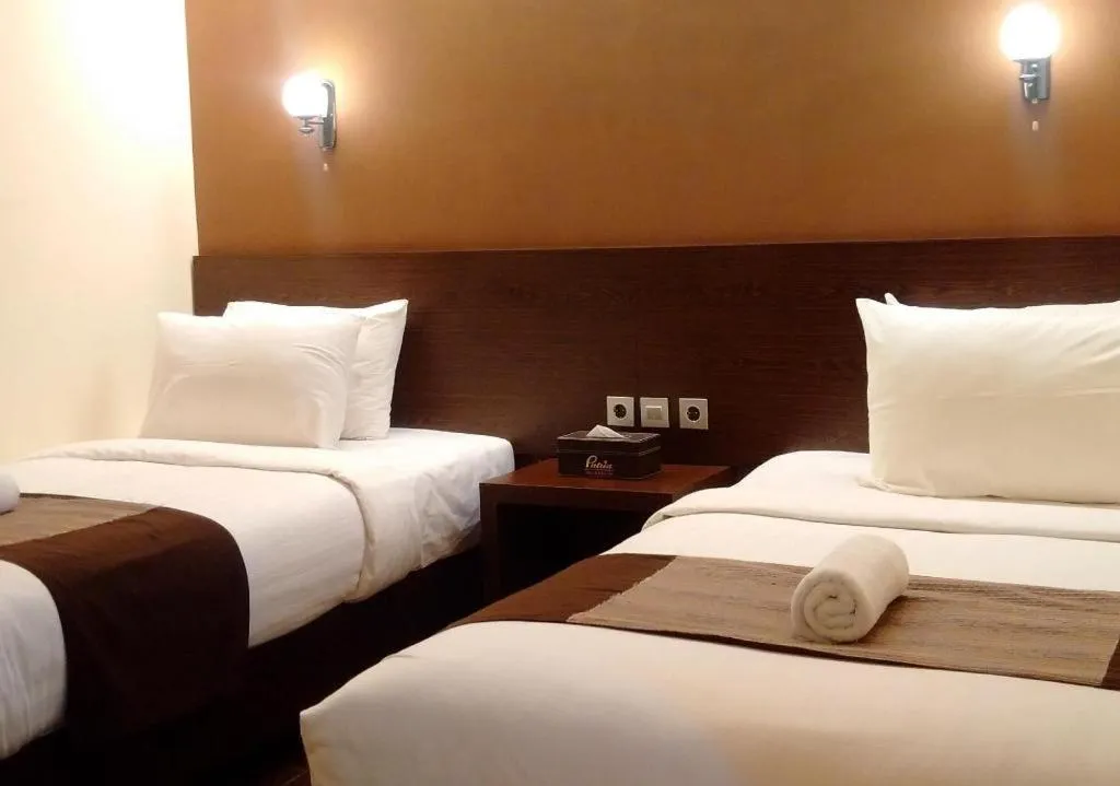 Bed in Patria Palace Hotel