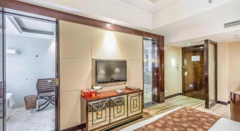 Bed in New Century Grand Hotel Xinxiang