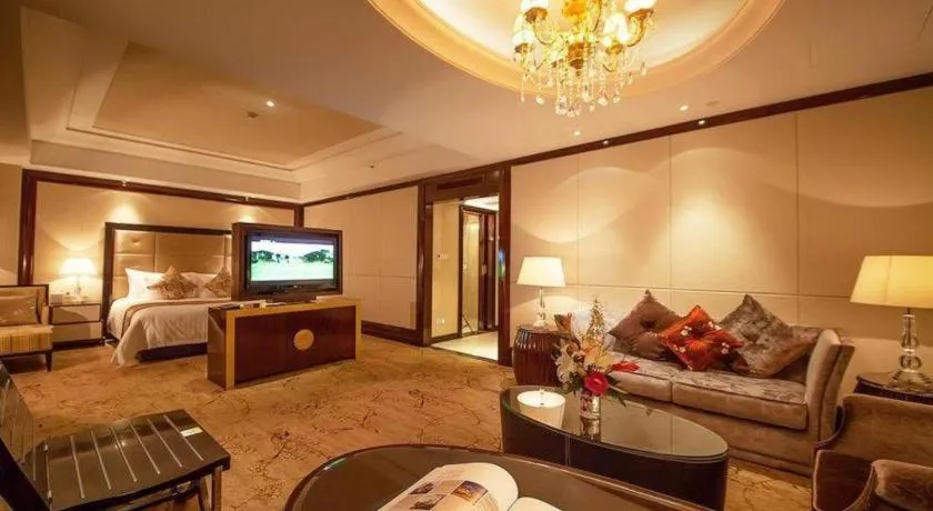 Bed in New Century Grand Hotel Xinxiang