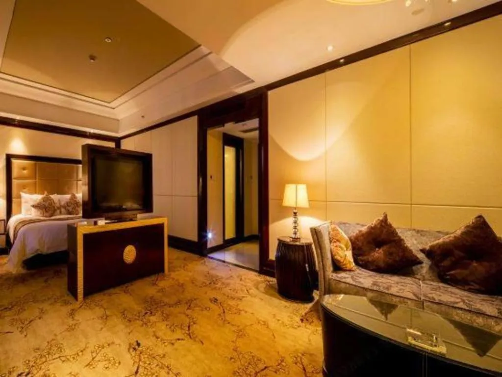 Bed in New Century Grand Hotel Xinxiang