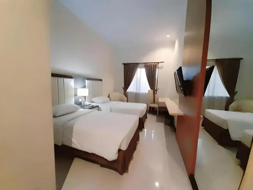 Bed in Bella Hotel Surabaya