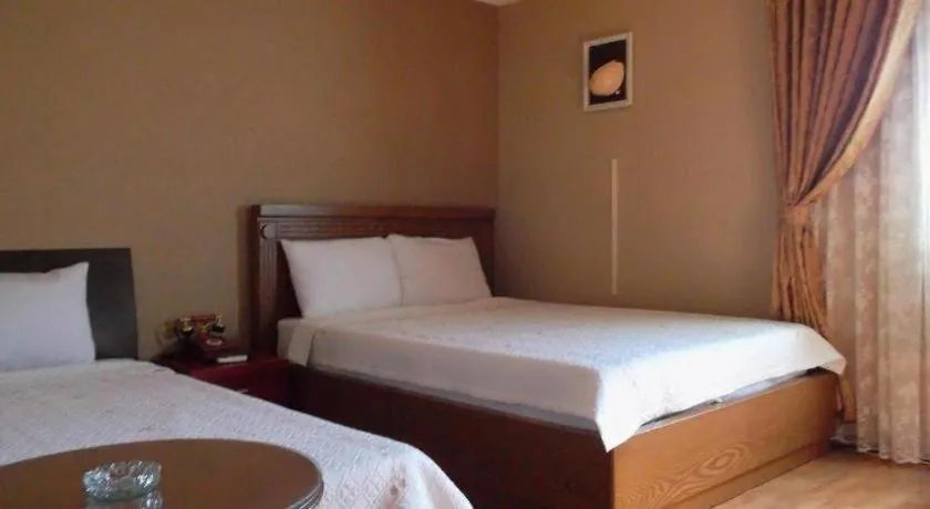 Bed in Monaco Hotel Jeju