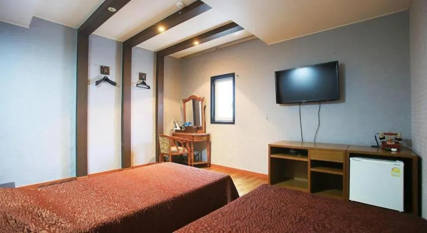 Bed in Monaco Hotel Jeju