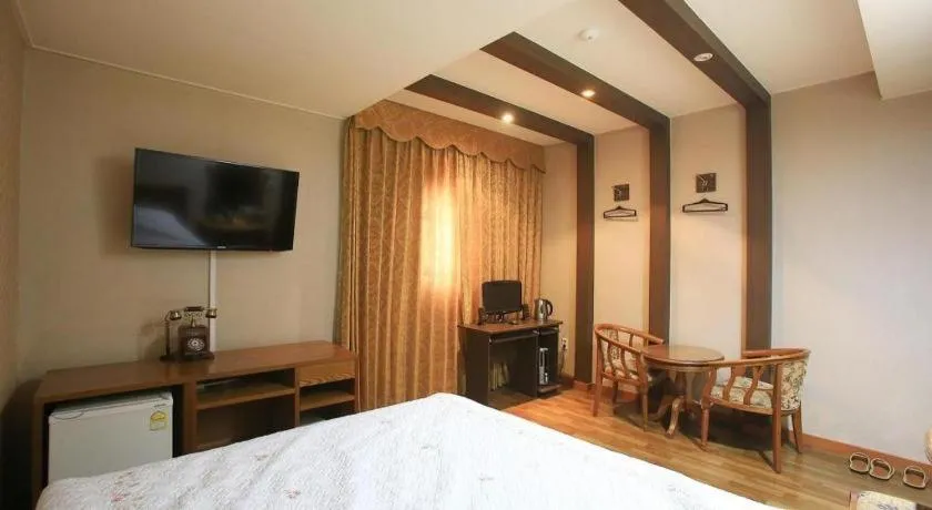 Bed in Monaco Hotel Jeju