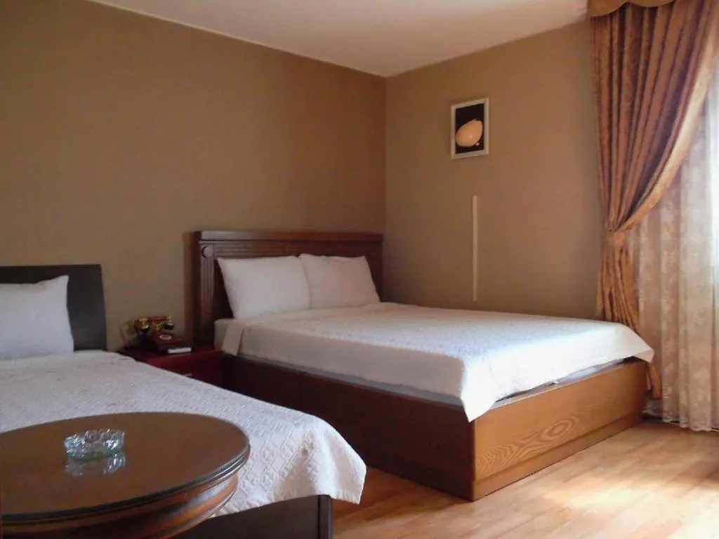 Bed in Monaco Hotel Jeju