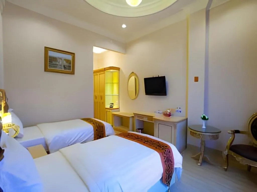 Bed in Hotel Grand Town