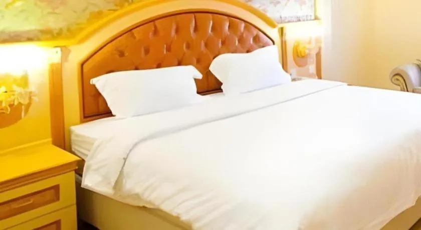 Bed in Hotel Grand Town