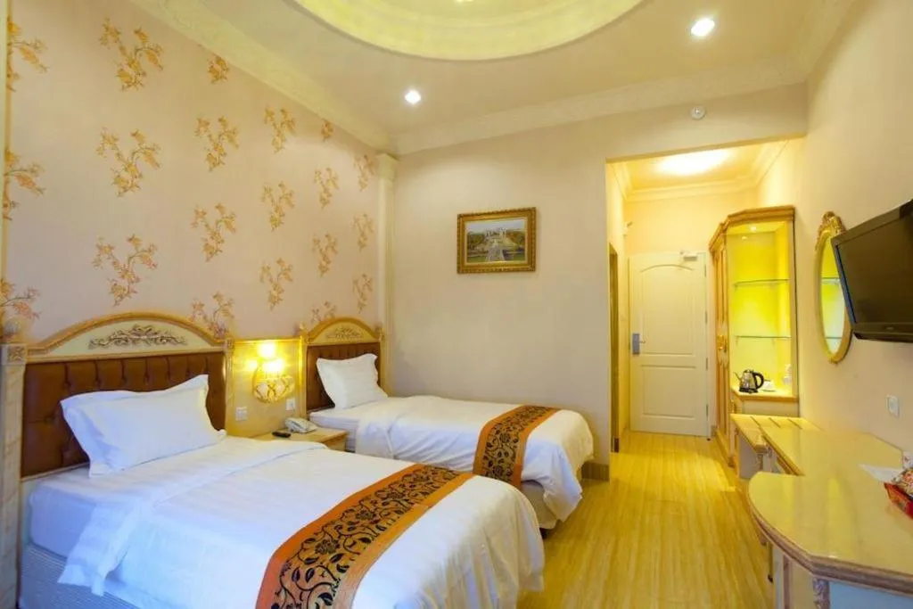 Bed in Hotel Grand Town