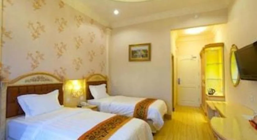 Bed in Hotel Grand Town