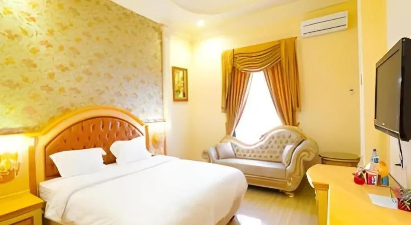 Bed in Hotel Grand Town